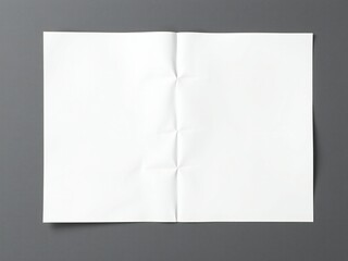 Crinkled white paper folded in half on a dark gray background