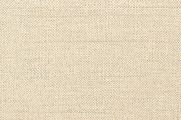 A beige background with small brown and tan speckles throughout texture