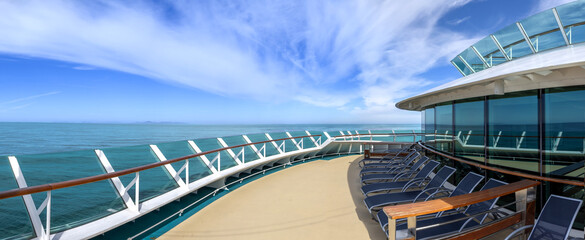 Panoramic ocean view of luxury cruise ship heading to vacation.