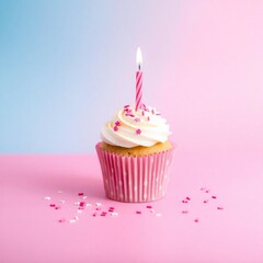 Delicious birthday cupcake with pink candle and sprinkles on pastel background