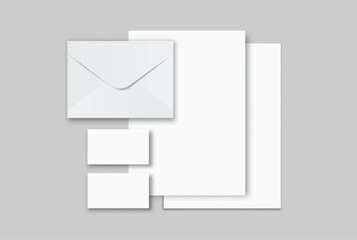 Minimal white envelope, business card and paper mockup set on neutral background, clean stationery composition for corporate branding, business correspondence, invitation layout, print presentation