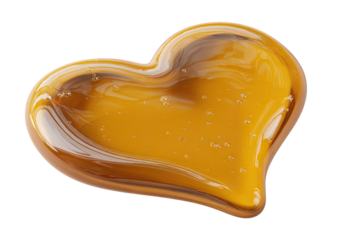 Glossy heart-shaped puddle of amber liquid, with air bubbles, on black