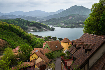 Scenic village with colorful houses, lake, and mountain views in Seoul