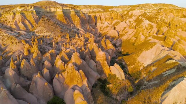 Goreme, Nevsehir, Turkey. Educational view of Devrent Valley showing interesting erosion patterns and geological features at dusk.. Aerial View