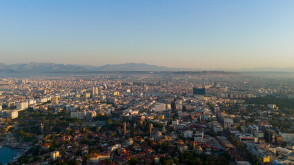 Antalya, Turkey. Panoramic aerial drone view showing Kaleici Old Town surrounded by modern urban development and Mediterranean Sea coastline.. Aerial View