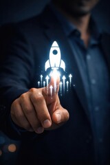 Businessman touching rocket launch icon on virtual screen, startup growth concept, innovation and digital transformation, futuristic technology interface
