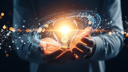 Hand holding glowing light bulb with digital network innovation concept