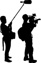 Silhouette of a professional film crew with cameraman and boom operator working © Rizky