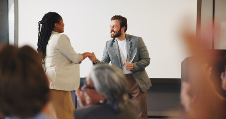 Handshake, audience and speaker with award for presentation, business conference or event....
