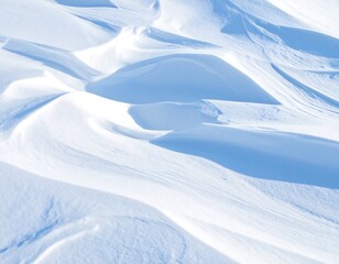 Soft white snow drifts under a cool blue sky, texture and light
