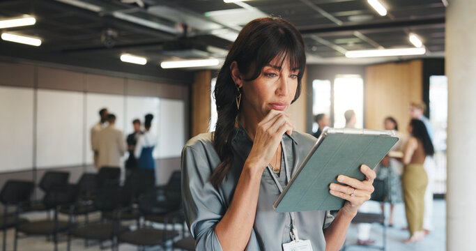 Business, thinking and woman in workshop, tablet or seminar coordinator with solution. Mature person, tech or employee at conference, crisis management or online reading for agenda or client feedback