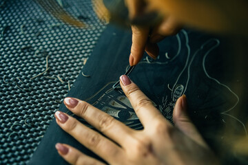 Linocut artist hand curving printmaking hobby