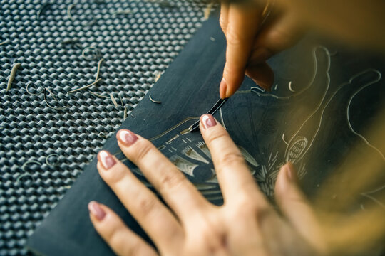 Linocut artist hand curving printmaking hobby