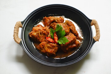 Spicy chicken stew in a plate 