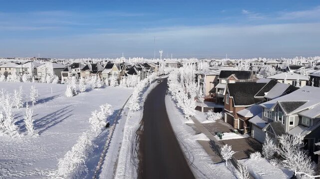 Aerial view of suburban north american city on a freezing winter day. 