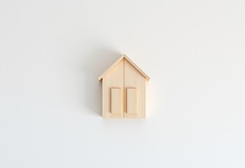 3d illustration of a small wooden house icon with a real property design featuring a roof window and door on a white background for real estate business and residential construction concepts