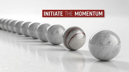 Row of Polished Marbles Initiate Momentum