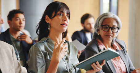 Business woman, tablet and talk at conference with group for corporate training, explain or respond...