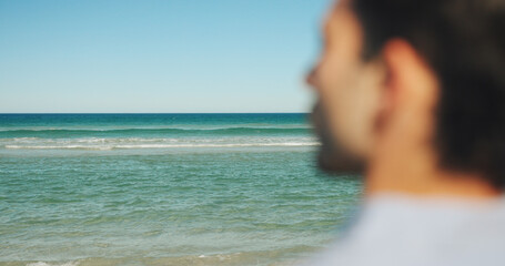 Person, thinking and horizon at ocean for travel, sky space and peace on vacation. Man, reflection and view at seaside with perspective, summer holiday and mental health wellness with mindfulness