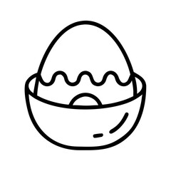 Decorative Easter egg in a bowl with icing design  