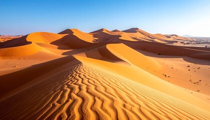 Smooth desert sand dunes with gentle shadows, clear blue sky, minimal natural landscape, high-contrast sunlight, clean stock photo composition