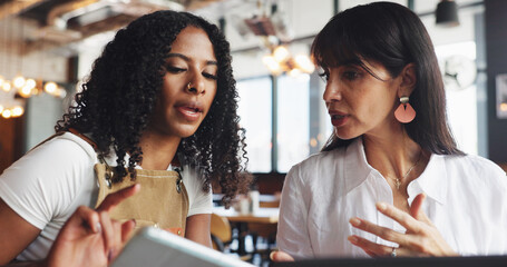 Cafe owner, woman and meeting with tech for online inventory checklist, staff schedule or review supplier info. People, boss and waitress on tablet for menu plan, laptop and coffee shop budget chat