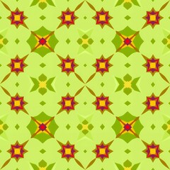 Repeating geometric pattern with abstract star shapes in vibrant green yellow red and purple