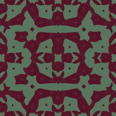 Abstract symmetrical pattern featuring dark red shapes and a muted green background