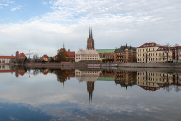 Naklejka premium Wroclaw Old Town skyline reflected in the Oder River, Poland
