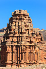 Intricate rock carving architecture of historic Badami temples built in 6th century are a complex of Buddhist, Hindu and Jain cave temples in Karnataka, India.