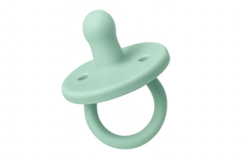 Green baby pacifier helping calm newborn during sleep