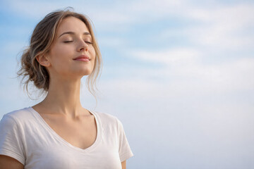 Peaceful woman breathing fresh air outdoors with eyes closed under blue sky, natural daylight and soft colors conveying freedom, calm, and emotional balance, perfect for mindfulness themes, clarity