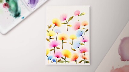 A creative timelapse of a handmade greeting card being crafted with watercolor flowers appearing on textured paper, concept of personal touch and heartfelt message