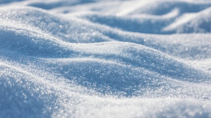 Obraz premium Close up of sparkling blue and white snow drifts under bright sunlight winter texture
