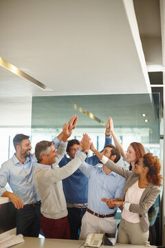 High five, success and team with business people in meeting for celebration, target and planning. Support, project and promotion with group of employees in office for mission, goal and praise