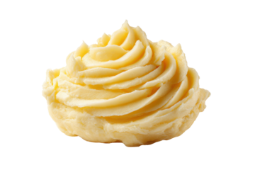 Closeup of pale yellow mashed potato swirl piped into rose shape on black background food