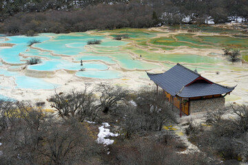 Beautiful scenic Huanglong Valley , a turquoise, calcite-rich pools along the limestone terraces 