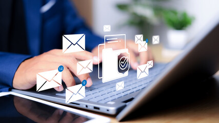 Person checking smartphone with email icons floating above. Concept of digital communication, mobile inbox, real-time notification, and online message system.