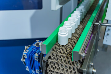 conveyor line for the production of plastic bottles close-up