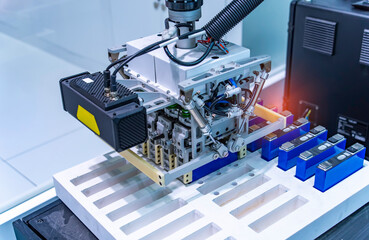 Advanced Industrial Robot Arms Assemble EV Battery Pack on Automated Production Line in Modern Electric lithium battery Smart Factory.