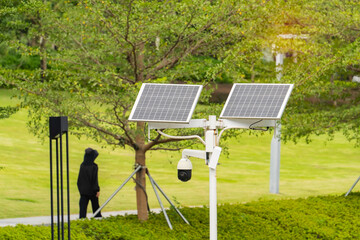Solar powered camera monitoring system. Smart city part of video surveillance on the urban streets