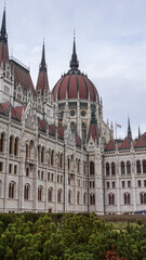 Obraz premium Architecture detail of the ornate neo-gothic Hungarian Parliament building. Located on the banks of the Danube River, in the center of Budapest