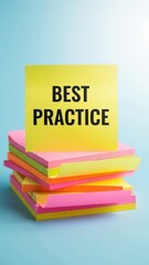 Best Practice text on yellow sticky note on a stack of colorful memo pads