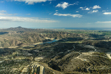 Aerial Drone View of Cyprus Mountain Landscape with Dipotamos Reservoir and Larnaca City on the...
