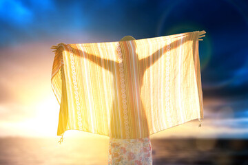 Woman silhouette sunrise light nature sky spiritual freedom wellness mindfulness peace calm harmony serenity healing soul fabric sunlight serenity zen healing positivity mental health wellness hope.