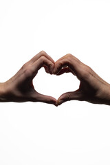 Two hands from opposite sides join to create a heart shape, symbolizing love, unity, and compassion, set against a clean white background with copy space