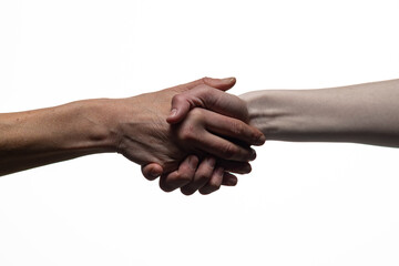 Two hands clasping in a handshake, symbolizing agreement, unity, or trust, against a white background. Includes copy space for text or design elements