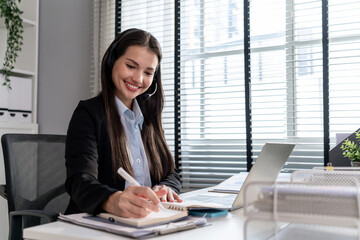Mixed race young businesswoman call center working in office workplace. 