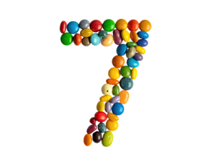 Number 7 made of colorful candy on black