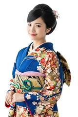 Portrait of an elegant Japanese woman wearing a traditional blue floral kimono with a gold obi, smiling gently and clasping her hands against an isolated background.